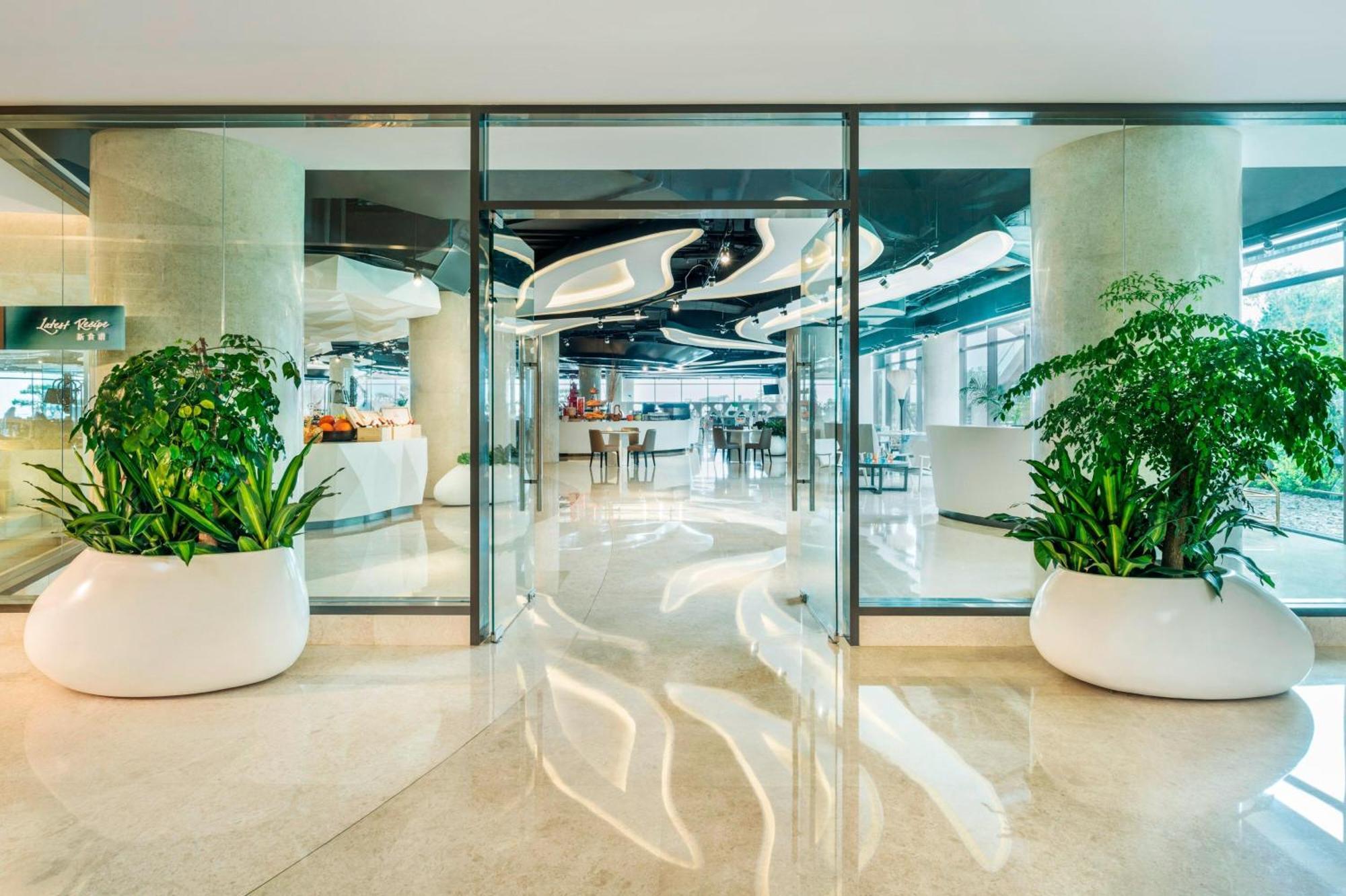 Le Meridien Qingdao West Coast Resort Extérieur photo