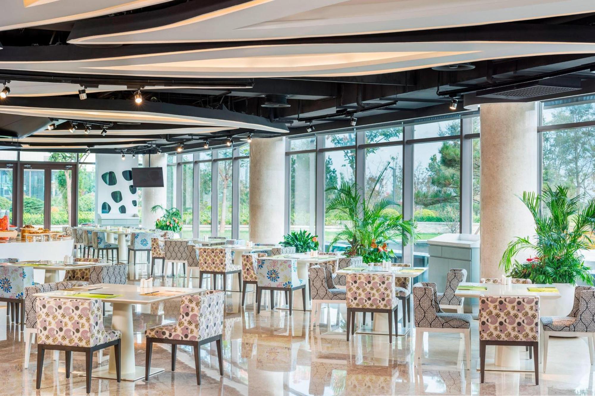 Le Meridien Qingdao West Coast Resort Extérieur photo